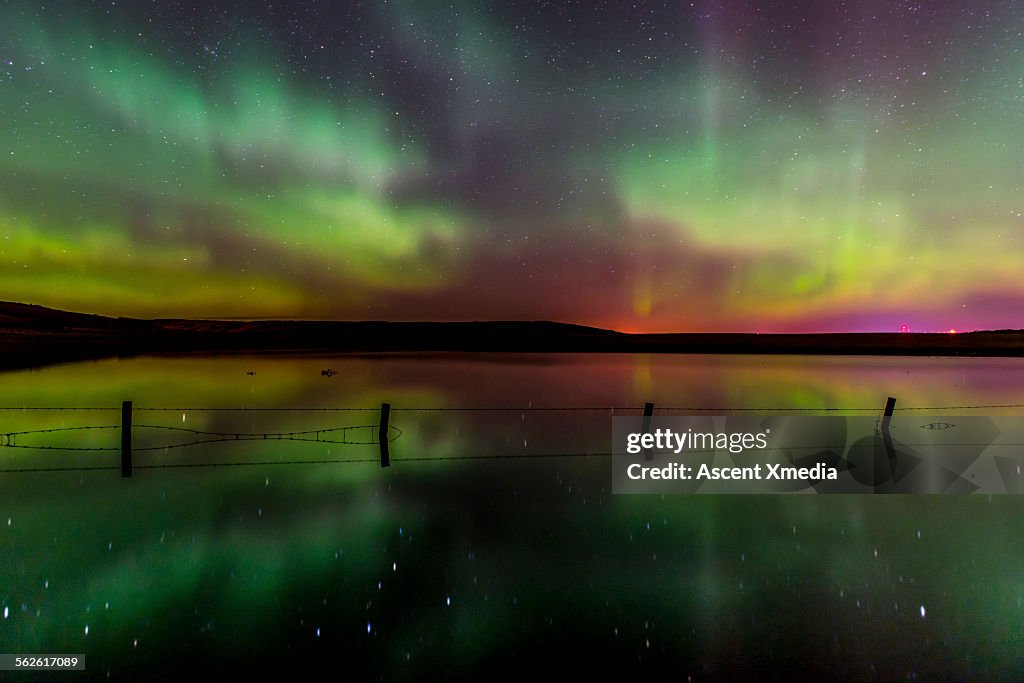 Aurora Borealis (Northern lights),in rural setting