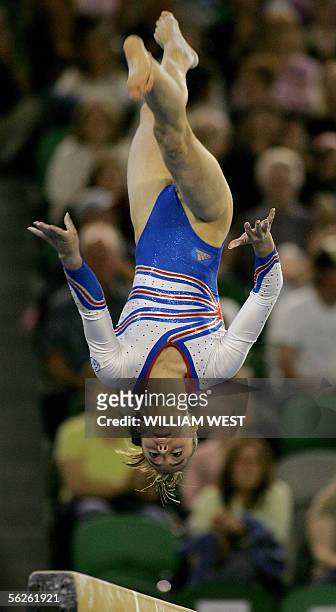 Emilie Le Pennec of France goes through her routine on the beam in the women's qualification at the 38th Artistic Gymnastics World Championships in...