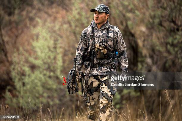 a man turkey hunting. - montana western usa stock pictures, royalty-free photos & images