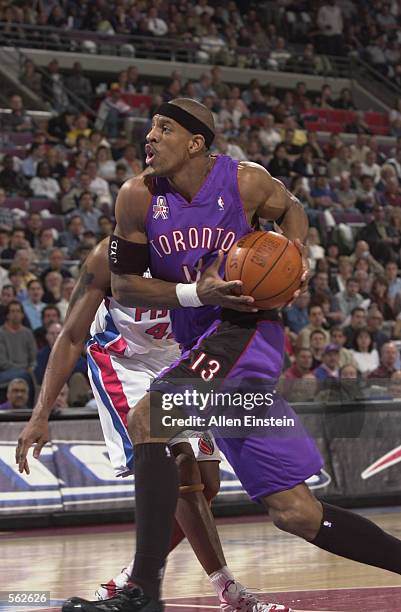 Forward Jerome Williams of the Toronto Raptors drives to the basket during game 2 of the Eastern Conference Quarterfinal series during the 2002 NBA...