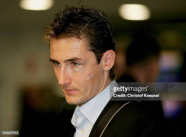 Miroslav Klose with his zygomatic break is seen before take-off to Germany at Barcelona airport on November 23, 2005 in Barcelona, Spain.