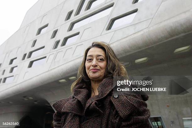 Iraqi-born London-based architect Zaha Hadid poses in front of the building housing the "Phaeno" Science Center and museum in Wolfsburg 23 November...