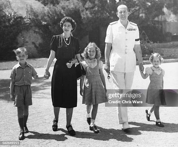 King Paul of Greece with his wife Frederika and children Prince Constantine and Princesses Sophia and Irene, in the grounds of the Royal Palace in...