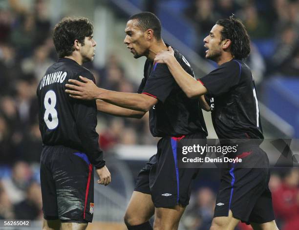 John Carew of Lyon celebrates his goal with Pernambucano Juninho during the UEFA Champions League group F match between Real Madrid and Olympique...