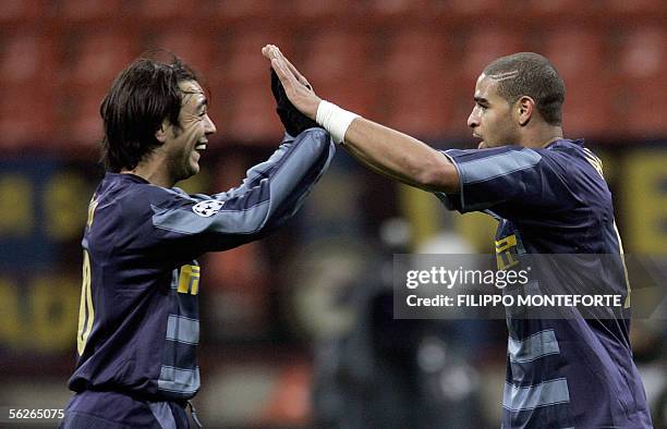 Inter Milan's Adriano jubilates with teammate Alvaro Recoba after scoring a goal to FC Artmedia Bratislava during Group H Champions league football...