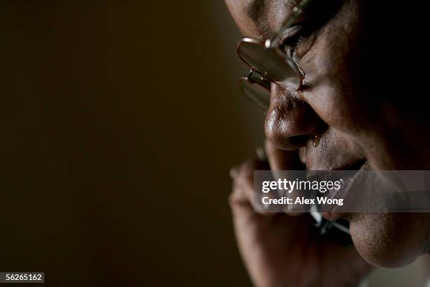 Tear comes out from the eyes of Hurricane Katrina evacuee Kathy Curry of New Orleans cries as she learns that her daughter cannot make it for...