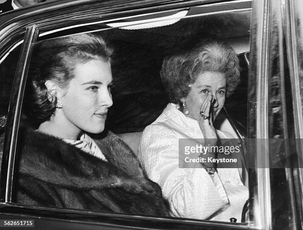 Queen Anne Marie of Greece, wife of King Constantine, and Queen Mother Fredrika in the back of a car leaving the Greek Embassy in Rome, December 17th...