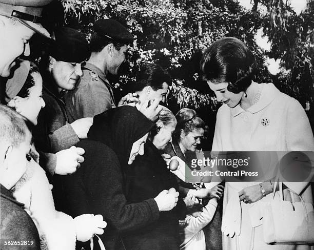 Queen Anne Marie of Greece greeting people at the Royal Guard Camp, part of a Royal tradition with her husband King Constantine on Easter Day,...