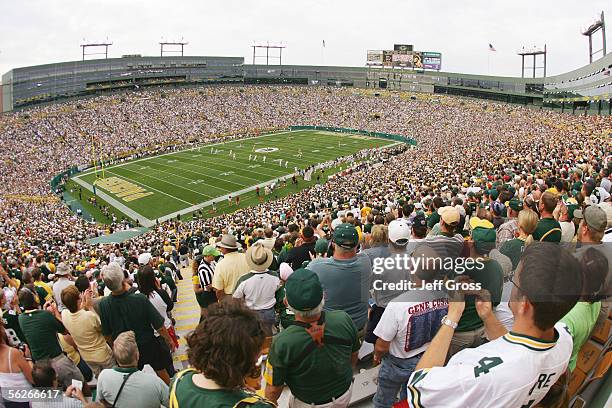Green Bay Packers fans cheer from the stands against the Cleveland Browns at Lambeau Field on September 18, 2005 in Green Bay, Wisconsin. The Browns...