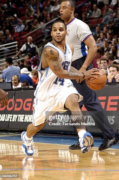 Jameer Nelson of the Orlando Magic drives against the Washington Wizards on November 23, 2005 at TD Waterhouse Centre in Orlando, Florida. The Magic...