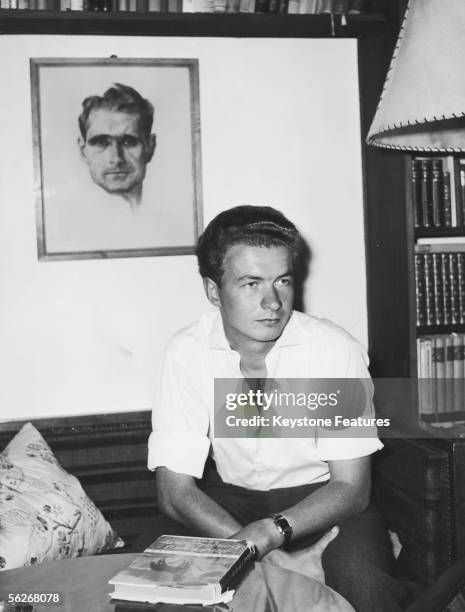 Wolf Rudiger Hess , the son of imprisoned Nazi leader Rudolf Hess, with a portrait of his father, September 1959. Wolf Rudiger Hess is pursuing a...