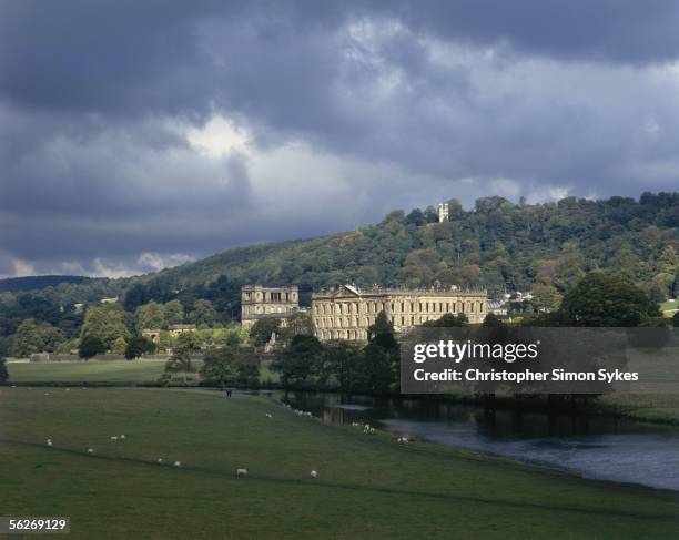 Chatsworth House in Derbyshire, 1990s. The Hunting Tower can be seen atop the hill behind.