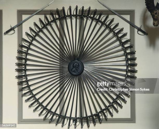 Radial arrangement of swords in the Guard Room of Belvoir Castle, Leicestershire, 1990s.