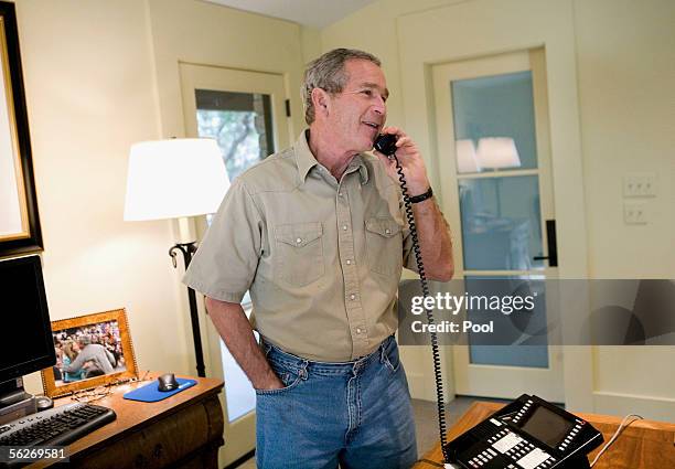 President George W. Bush calls troops on Thanksgiving Day on November 24, 2005 from his ranch in Crawford, Texas.