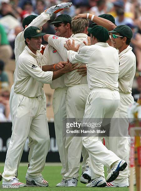 The Australians celebrate the wicket of Devon Smith of the West Indies during day one of the Third Test between Australia and the West Indies played...