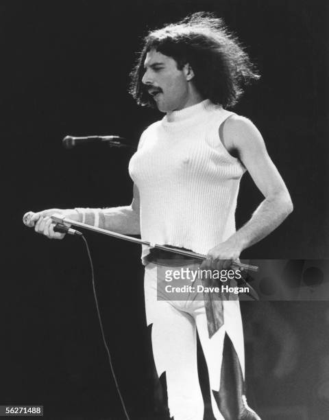 Singer Freddie Mercury performing with his group Queen at the inaugural Rock In Rio festival in Rio de Janerio, 24th January 1985. He is in drag...