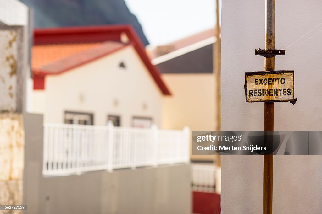 Old street sign depicting except residents