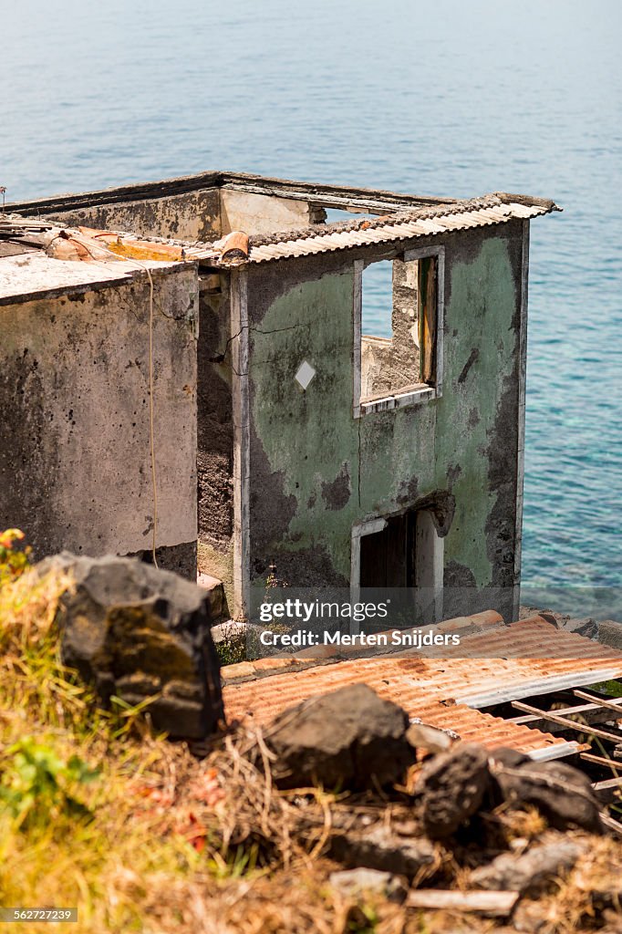 Impoverished house overlooking ocean