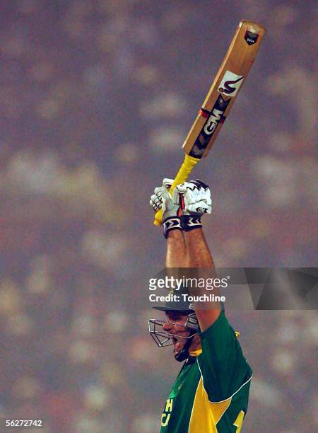 Graeme Smith of SOuth Africa celebrates his century during the Fourth One Day International between India and South Africa at Eden Gardens November...