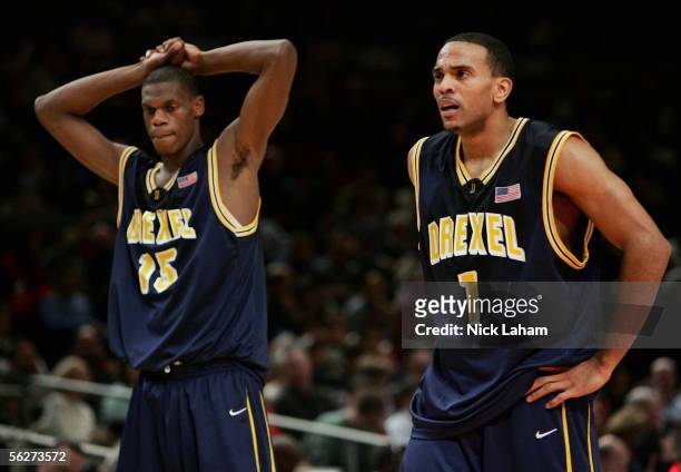 Frank Elegar and Kenell Sanchez of the Drexel Dragons react to losing their Preseason NIT Tournament game to the UCLA Bruins at Madison Square Garden...