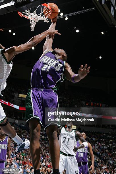 Bobby Simmons of the Milwaukee Bucks puts the ball in the basket against the Minnesota Timberwolves on November 25, 2005 at the Target Center in...