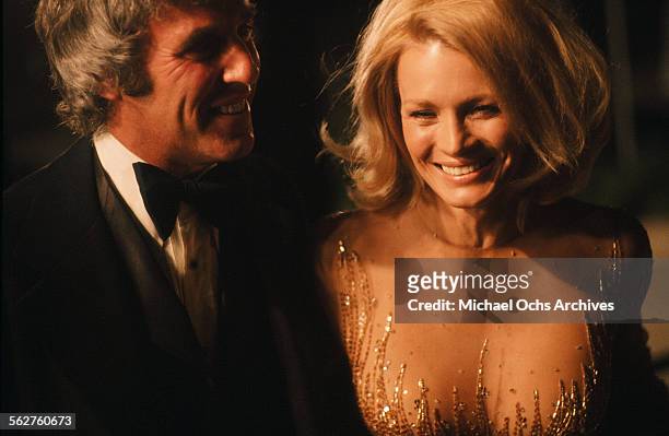 Composer Burt Bacharach with wife actress Angie Dickinson arrive to the 48th Academy Awards at Dorothy Chandler Pavilion in Los Angeles,California.