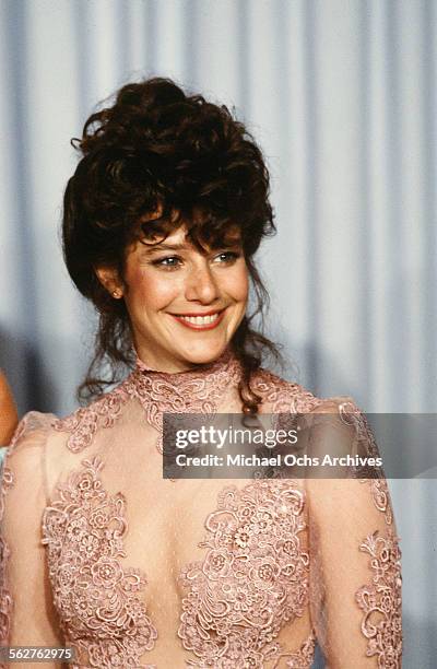 Actress Debra Winger poses backstage during the 54th Academy Awards at Dorothy Chandler Pavilion in Los Angeles,California.