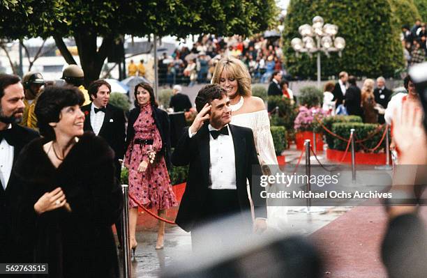 Actor Dudley Moore with actress Susan Anton arrive to the 54th Academy Awards at Dorothy Chandler Pavilion in Los Angeles,California.