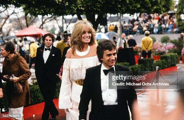 Actor Dudley Moore with actress Susan Anton arrive to the 54th Academy Awards at Dorothy Chandler Pavilion in Los Angeles,California.