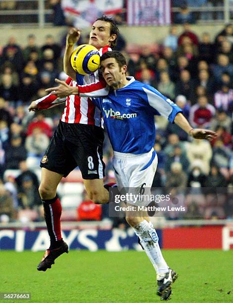 Dean Whitehead of Sunderland and Muzzy Izzet of Birmingham challenge for the ball during the Barclays Premiership match between Sunderland and...