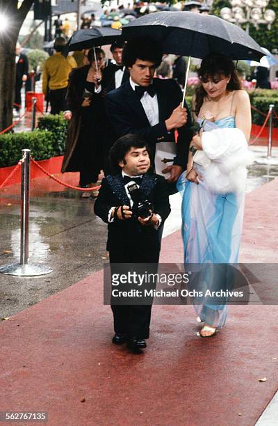 Actor Herve Villechaize with actress Kathy Self arrive to the 54th Academy Awards at Dorothy Chandler Pavilion in Los Angeles,California.