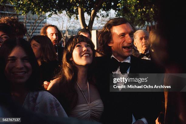 Hugh Hefner with Playmate Barbi Benton arrives to the 46th Academy Awards at Dorothy Chandler Pavilion in Los Angeles,California.
