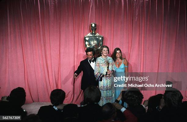 Actor Peter Falk Actress Ingrid Bergman and actress Katharine Ross pose backstage after the "Best Supporting Actress" award during the 47th Academy...