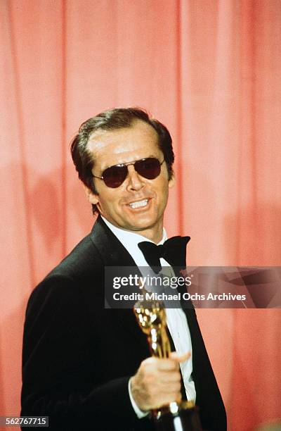 Actor Jack Nicholson pose backstage after winning "Best Actor" and "Best Actress" for "One Flew Over the Cuckoo's Nest" during the 48th Academy...