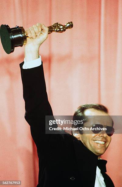 Actor Jack Nicholson pose backstage after winning "Best Actor" and "Best Actress" for "One Flew Over the Cuckoo's Nest" during the 48th Academy...