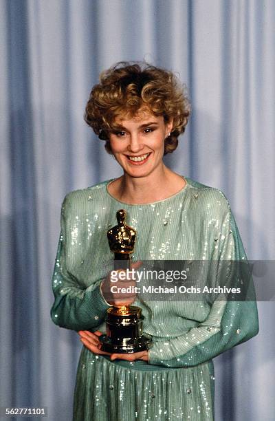 Actress Jessica Lange poses backstage after winning "Best Supporting Actress " at the 55th Academy Awards at Dorothy Chandler Pavilion in Los...