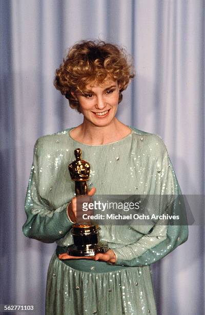 Actress Jessica Lange poses backstage after winning "Best Supporting Actress " at the 55th Academy Awards at Dorothy Chandler Pavilion in Los...