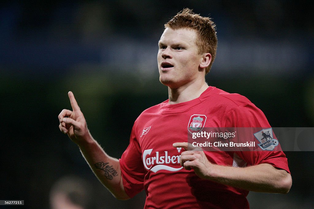 V Riise John Arne Riise of Liverpool celebrates his winning goal during the ...