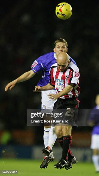 Joey Gudjonsson of Leicester is challenged by Alan Wright of Sheffield during the Coca-Cola Championship match between Leicester City and Sheffield...