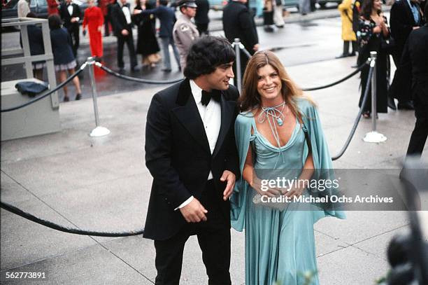 Actress Katharine Ross arrives with husband actor Gaetano Lisi to the 47th Academy Awards at Dorothy Chandler Pavilion in Los Angeles,California.