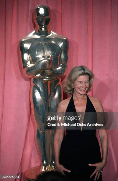 Lauren Bacall poses backstage after presenting " Best Costume Design" award during the 47th Academy Awards at Dorothy Chandler Pavilion in Los...