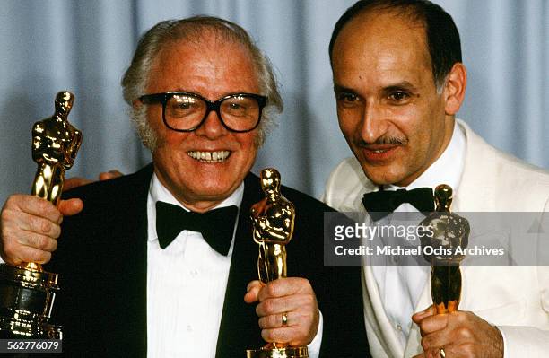 Richard Attenborough poses with Ben Kingsley backstage after winning "Best Director" and "Best Picture" and "Best Actor " for "Gandhi" at the 55th...