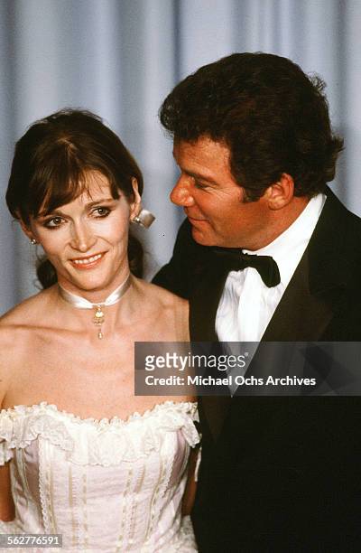 Actress Margot Kidder poses with actor William Shatner backstage during the 55th Academy Awards at Dorothy Chandler Pavilion, Los Angeles, California.