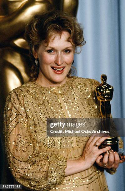 Actress Meryl Streep poses backstage after winning "Best Actress" during the 55th Academy Awards at Dorothy Chandler Pavilion in Los...