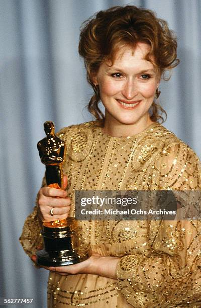 Actress Meryl Streep poses backstage after winning "Best Actress" during the 55th Academy Awards at Dorothy Chandler Pavilion in Los...