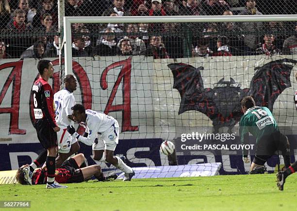 Lyon's forward Sydney Govou scores during the French L1 football match Nice vs Lyon, 26 November 2005, at the Ray stadium in Nice. The match ended...