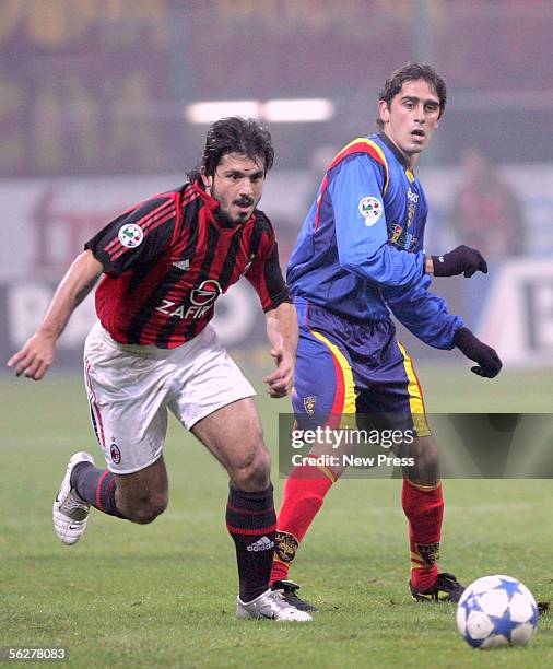 Gennaro Ivan Gattuso of Milan and Alex Pinardi of Lecca in action during the Serie A match between AC Milan and Lecce at the Giuseppe Meazza San Siro...