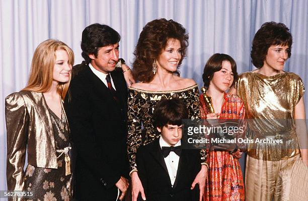 Actress Jane Fonda with husband Tom Hayden and family, Bridgette Fonda ,Troy Garity, Vanessa Vadim and Amy Fonda poses backstage after accepting her...