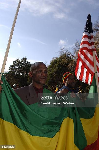 Ahmed Hussein of Houston, Texas marches in an Ethiopian rally for American support on November 26, 2005 in Crawford, Texas. The Ethiopian community...