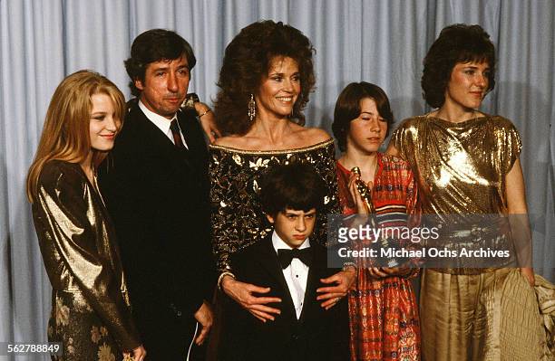 Actress Jane Fonda with husband Tom Hayden and family, Bridgette Fonda ,Troy Garity, Vanessa Vadim and Amy Fonda poses backstage after accepting her...